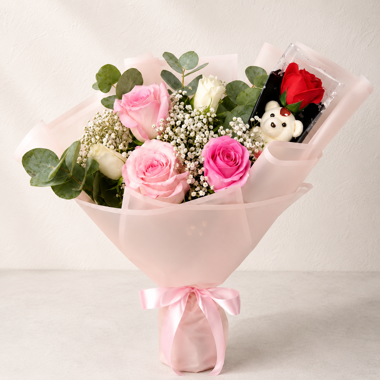ROSES WITH A BEAR