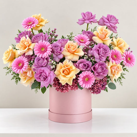 Purple And Peach Flowers In Box